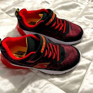 Red and Black Sketchers